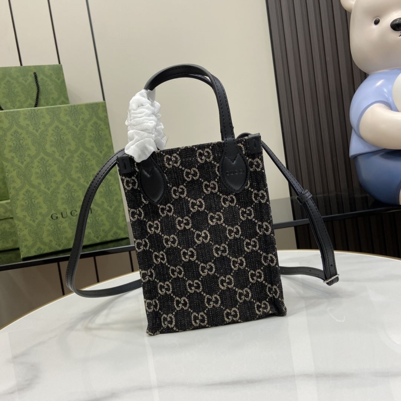 G*u*i top handle bags